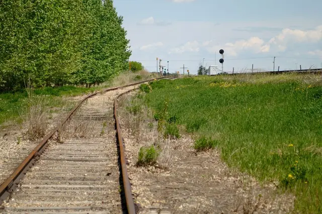 Railway tracks and signals at the edge of town